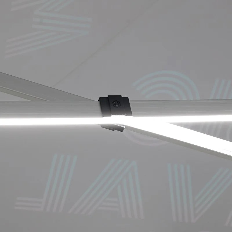 Branded LED canopy tent with expanded coverage for products, signage, counters, and visitor areas.